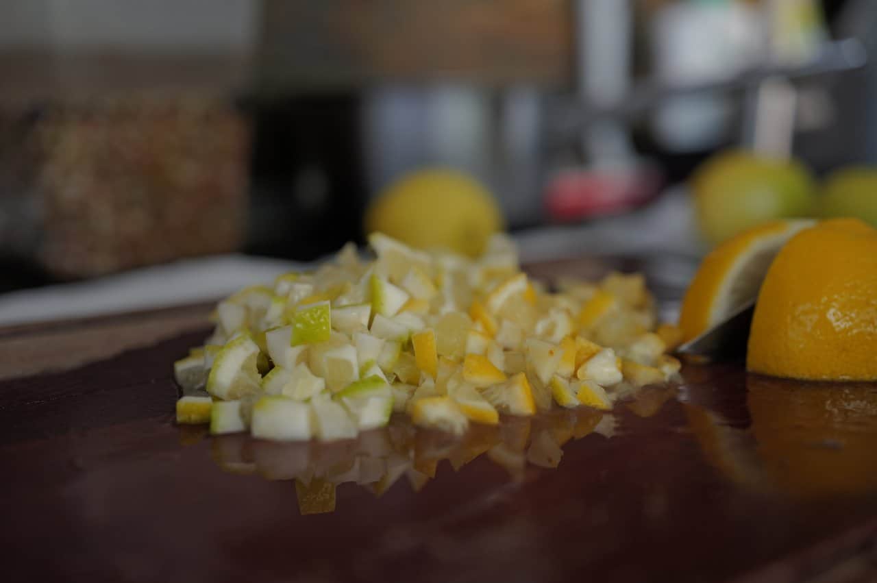Chopped Citrus Fruits Lemon Lime Preparation Cutting Board Cooking - integrative healthcare treatment at Healers Clinic Dubai