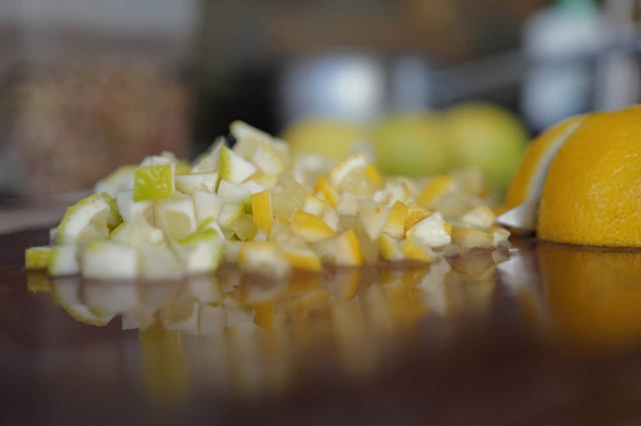 Diced Citrus Fruits Lemon Orange Preparation Reflective Surface Cooking - integrative healthcare treatment at Healers Clinic Dubai