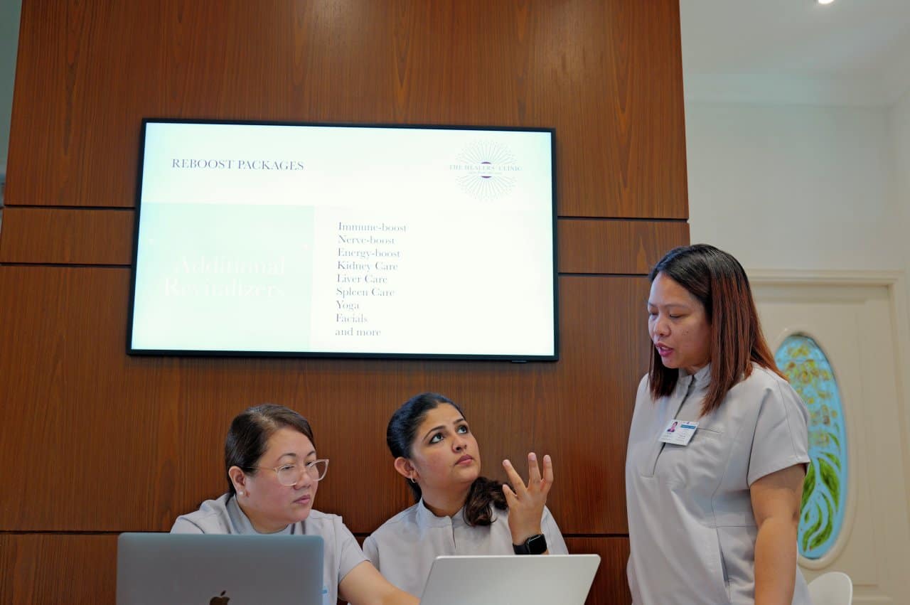Healers Clinic Team Discussion Reboost Packages Wellness Services - our qualified healthcare team at Healers Clinic Dubai